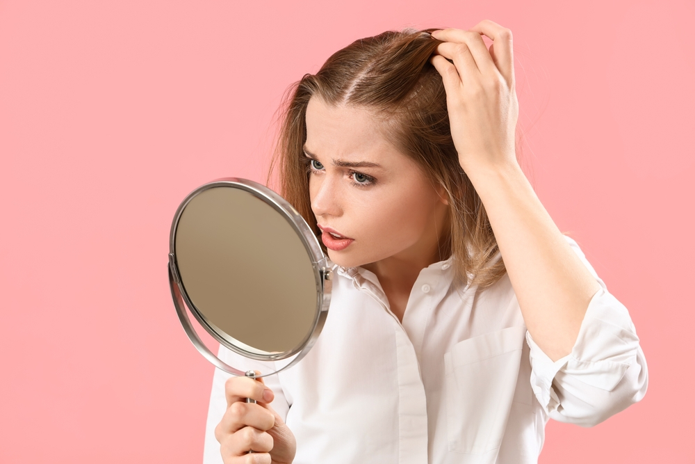 Hair Loss From Stress? Here's What You Can Do to Restore Your Hair | Essence Skin Clinic & Med Spa